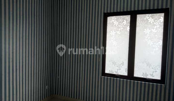 Disewakan Rumah 2 Lantai di Cluster Taman Sari, Harapan Indah Bekasi 1