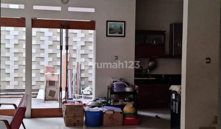 Rumah Modern Minimalis di Taman Kopo Indah 3 2