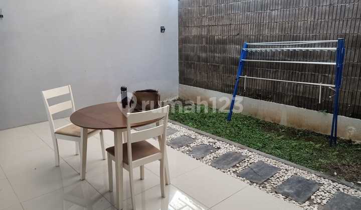 comfortable minimalist 2-story house in sariwangi 2
