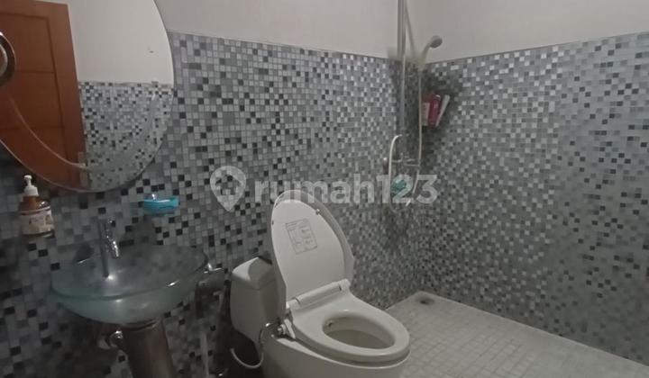 For Sale Cozy 2-Story Charming House in Sector 9 Puri Bintaro WT-16311 2