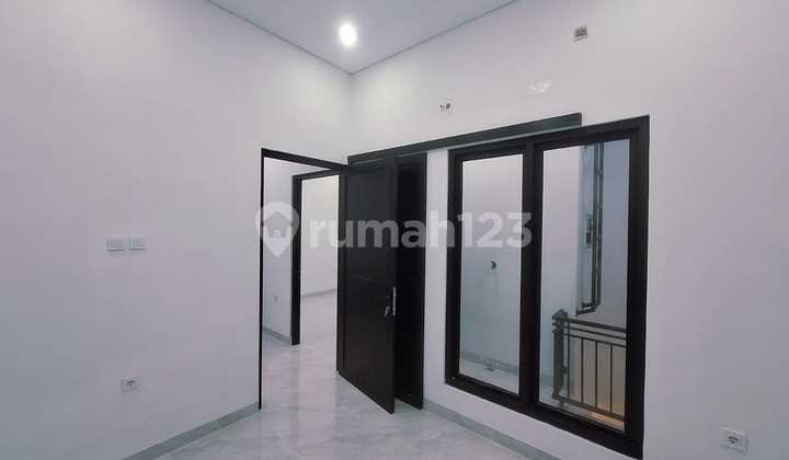 Rumah Terawat 2 Lantai Modern di Cluster Graha Raya Bintaro Rn-17390 2