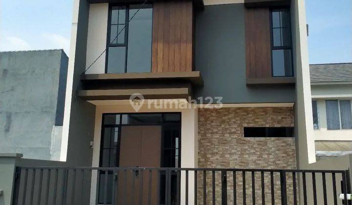 Rumah 2 Lantai Asri Lengkap Fasilitas Lokasi Strategis
