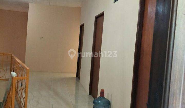 Dijual rumah kontrakan 2 lantai isi 10 kamar di Kelapa Dua 1