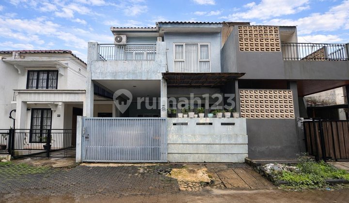 Graha Cinere House Facing Park