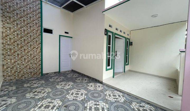 DI  RUMAH  DI PERUMAHAN DUTA GRAHA BLOK E10
