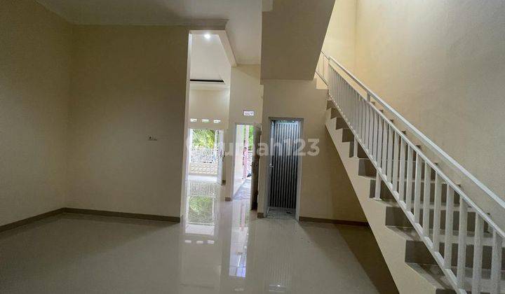 DI  RUMAH  DI PERUMAHAN DUTA GRAHA BLOK E10