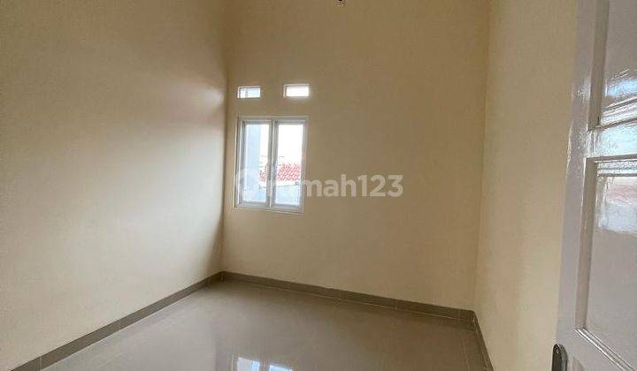 DI  RUMAH  DI PERUMAHAN DUTA GRAHA BLOK E10