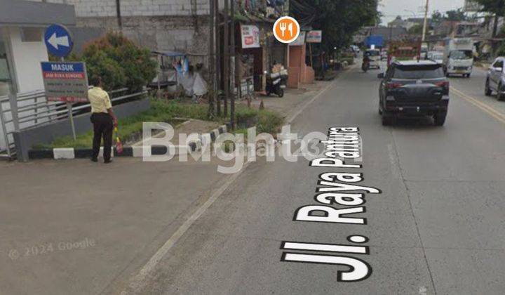 Tanah kavling di tepi jalan raya Bitung 1