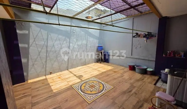 House for Sale in Cipageran Asri Complex. Serene Mountain Atmosphere with a View of Bandung City. 2