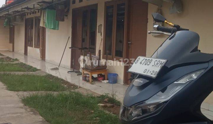 Dijual sangat murah rumah berbentuk kontrakan ada 11 pintu akses dua mobil full terisi semua buat investasi jangka panjang bagus ini tempat nya strategis muraaah 2