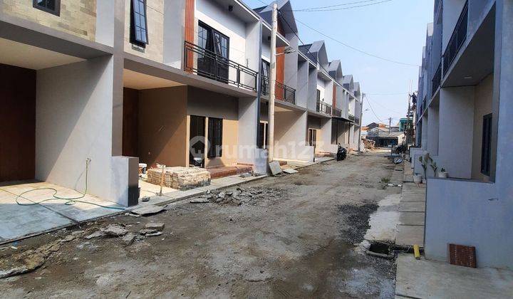 Rumah 2 Lantai di Jl raya gas alam SHM samping Tol 2