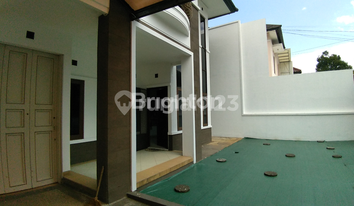 A charming 2-story house in one of the Batununggal housing clusters, Bandung.