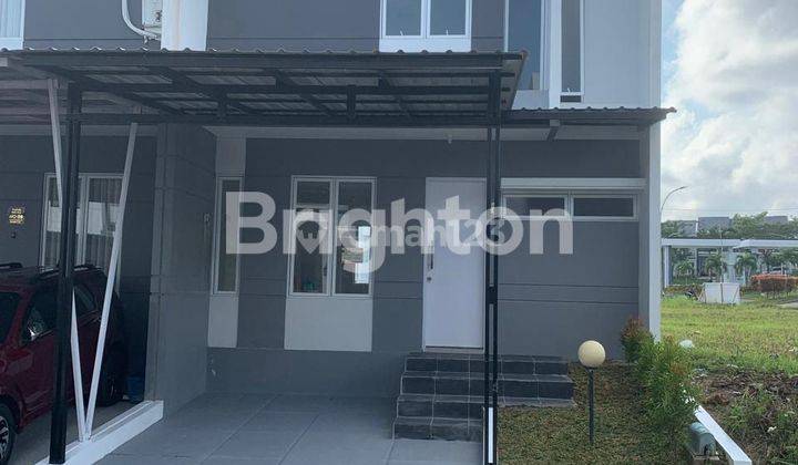 RUMAH MINIMALIS DUA LANTAI DI PERUMAHAN GRAND CITY