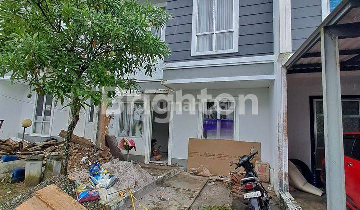 RUMAH MINIMALIS DUA LANTAI DI PERUMAHAN GRAND CITY