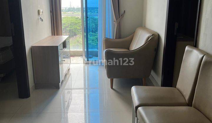 Di Sewakan Apartemen Puri Mansion Kamar 2+1 Furnished View Pool 1