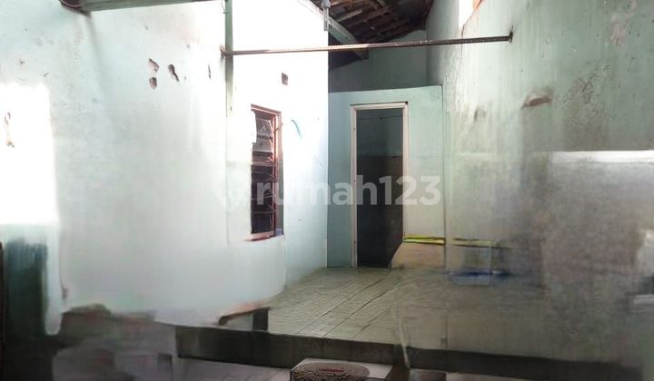 Rumah + Bengkel Mobil lokasi Strategis untuk usaha hadap Timur 2