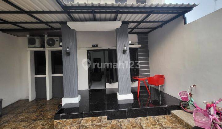 tampak depan rumah minimalis siap huni villa