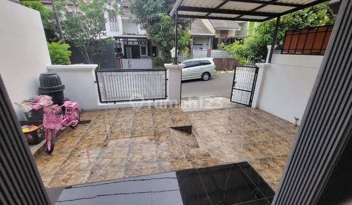 tampak depan rumah minimalis siap huni villa