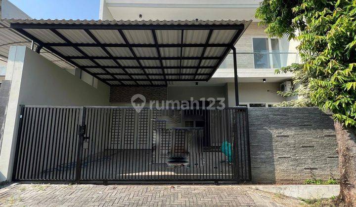 Rumah Modern Minimalis Siap Huni Citraland Utama Surabaya Barat 1