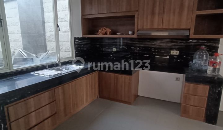 Well-Maintained Semi-Furnished Minimalist House in Graha Famili, West Surabaya 2
