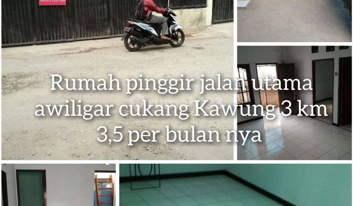 Rumah pinggir jalan utama masuk mobil ada carport nya