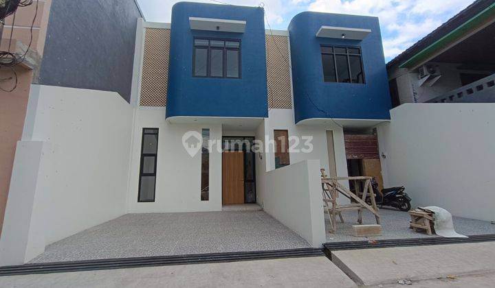 Langka! Rumah minimalis 100% Baru di Taman Kopo Indah 1 2