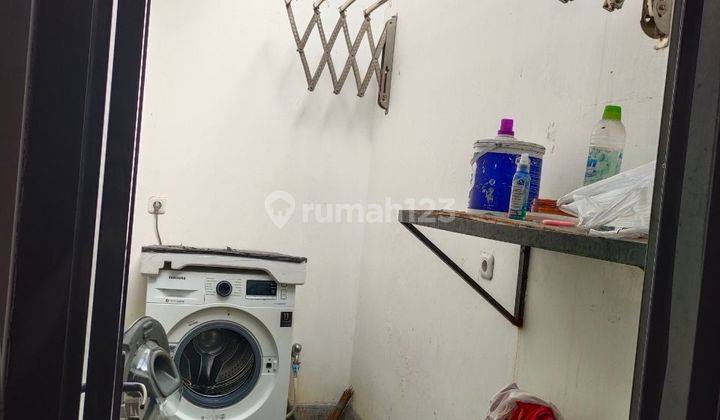 Rumah modern semi furnished di Bumi adipura 2