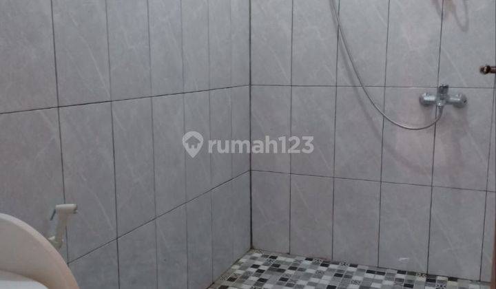 Rumah asri terawat siap huni di Taman Holis Indah 1 2