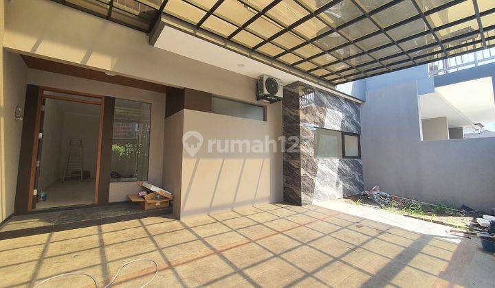 Rumah Modern Minimalis Siap Huni di Taman Holis Indah 1 1