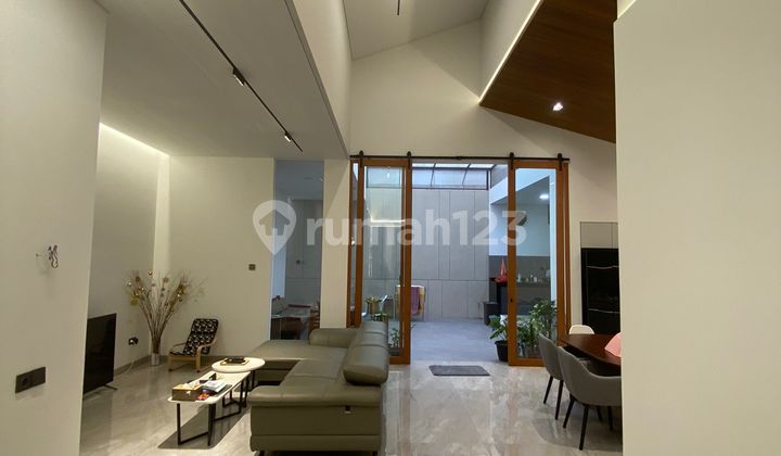 Rumah Modern Premium Jamin Nyaman di Taman Holis Indah 1