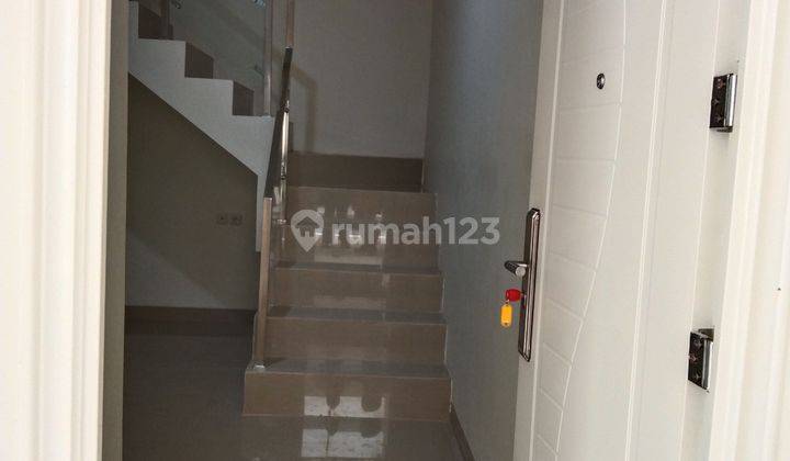   RUMAH DI JUAL  MEWAH PALMERAH UTARA BERGAYA FANTASTIK MILENIAL 10