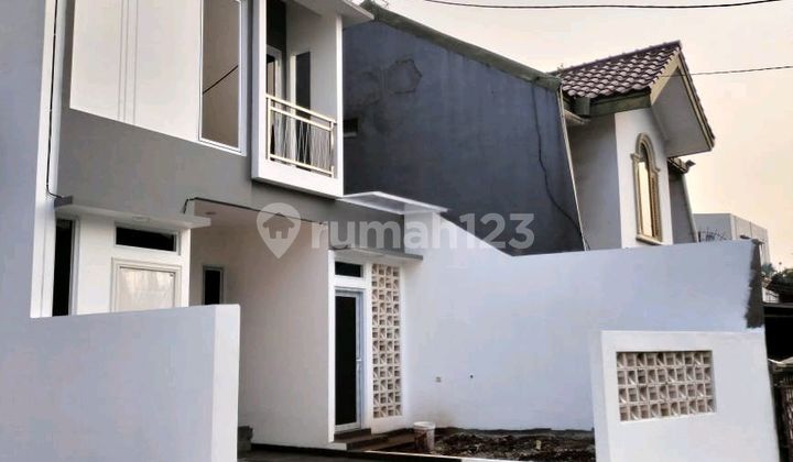 tampak depan rumah mewah dikawasan elit lokasi