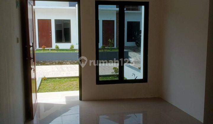 Rumah terasa punya villa Rumah di Jalan ciapus taman sari SHM Baru Selatan 7