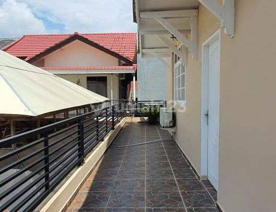 RUMAH CANTIQ ADA KOLAM RENANG PRIBADI DI PERUMAHAN PALM SPRING, LUAS TANAH 516 METER 10