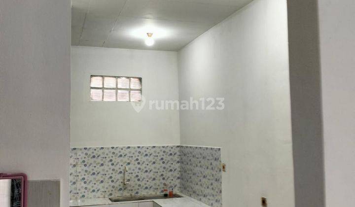 Rumah 1.5 lantai siap huni di Taman Holis Indah1 2