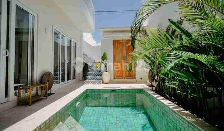 CONTEMPORARY 2-BEDROOM VILLA WITH ROOFTOP RICE FIELD VIEW IN CEMAGI