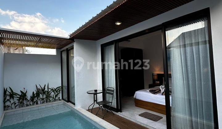 MODERN TROPICAL 2-BEDROOM VILLA WITH DUAL POOLS IN TRANQUIL TEGAL CEPUK, KEROBOKAN