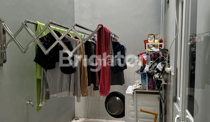 ruang jemur rumah cantik siap huni di
