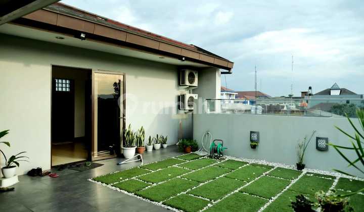 Rumah Bagus Terdapat Rooftop Area di Mainroad Garuda 1