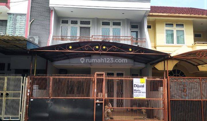 Rumah Bagus Siap Huni Harga Nego di Taman Surya 5, Ts 906 1