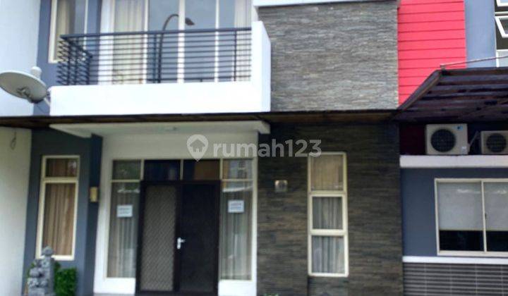 Rumah disewakan siap huni Kamar 4+1 di Puri Mansion, PM 328 1