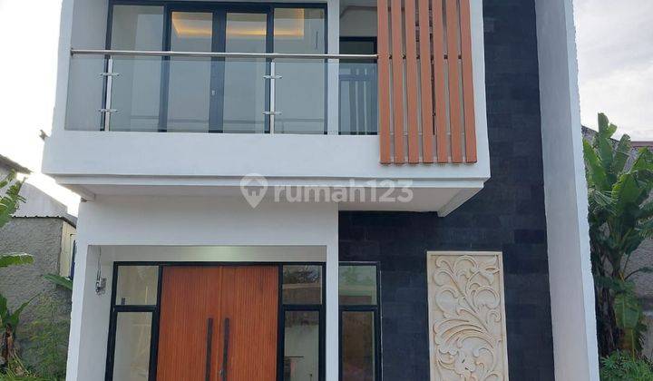 Rumah modern design bali selangkah dari stasiun lrt cikunir  2