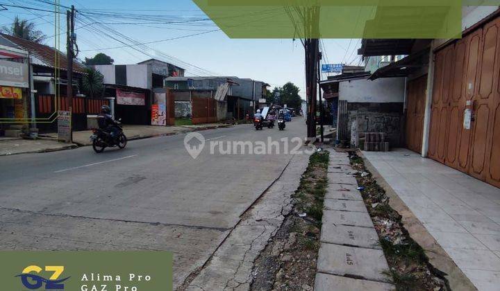 jual rumah dan bangunan pinggir jalan raya 1