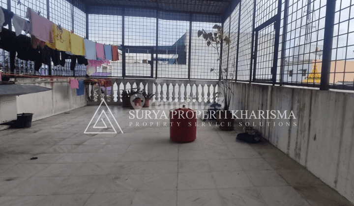 Di  Rumah di Jalan Tongkol, Medan Area