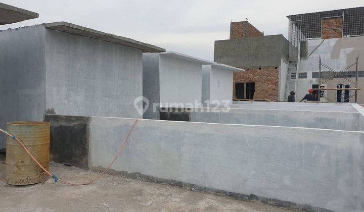 Di  Rumah Daerah Medan Perjuangan Komplek Woodville