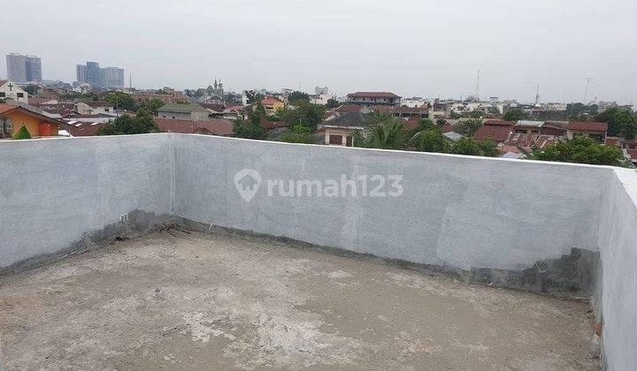 Di  Rumah Daerah Medan Perjuangan Komplek Woodville
