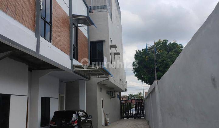 Di  Rumah Daerah Medan Perjuangan Komplek Woodville