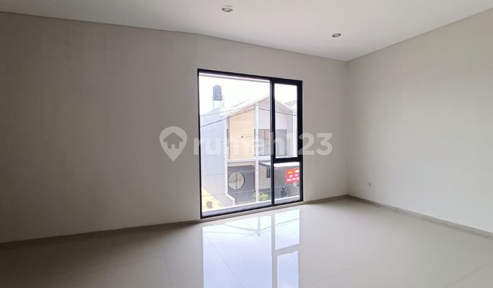 ruma minimalis modern di cluster budi luhur asri 2