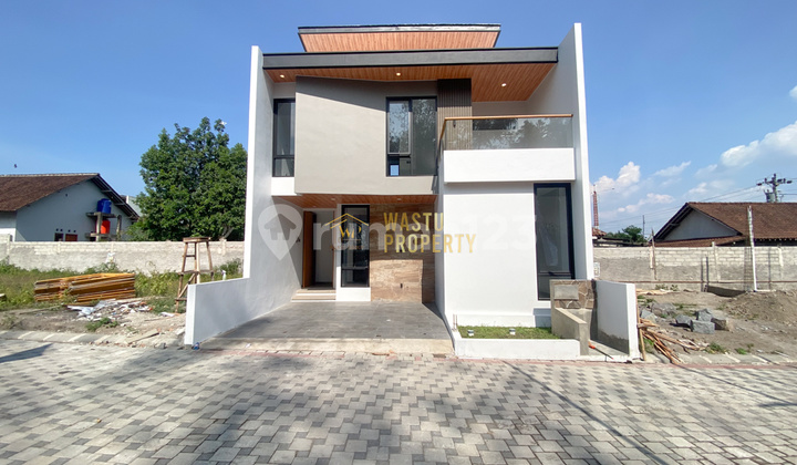 TWO-STORY MODERN STRATEGIC HOUSE IN SUKOHARJO, NGAGLIK TWO-STORY MODERN STRATEGIC HOUSE IN SUKOHARJO, NGAGLIK