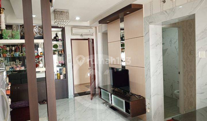 Dijual Apartemen Mediterania 2 Tower Heliconia Lantai Sedang Full Furnished 1